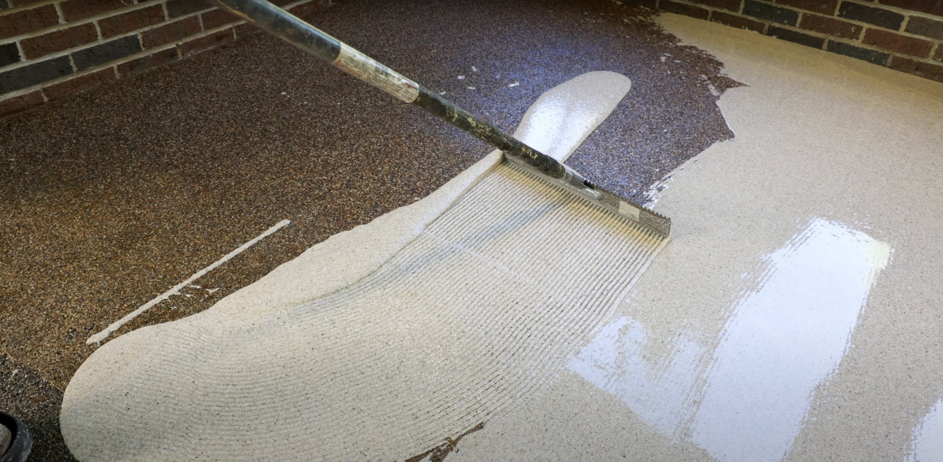 Expert concrete installation techniques by Haltom City Concrete - Professional surface finishing Professional concrete finishing work showing smooth, level surface installation techniques