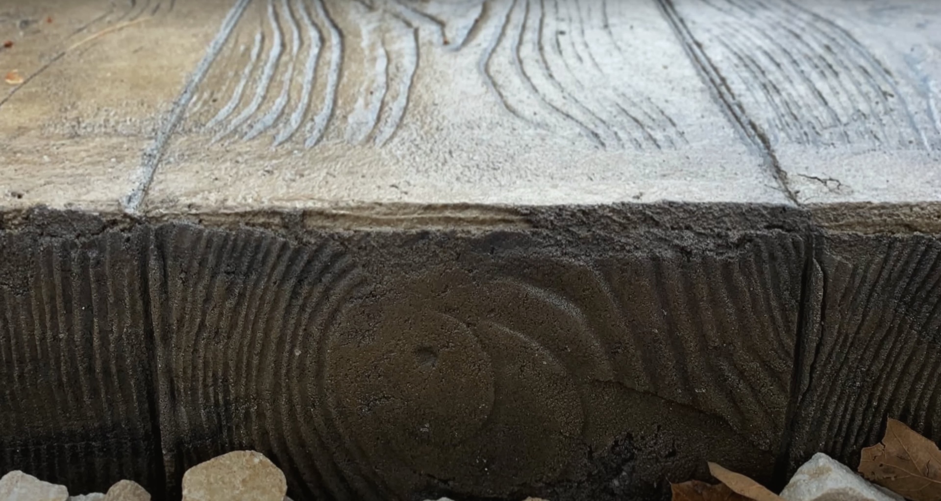 High-quality stamped concrete work by Haltom City Concrete - Realistic wood texture concrete finishing Detailed view of wood-textured stamped concrete showing realistic grain patterns and professional finishing