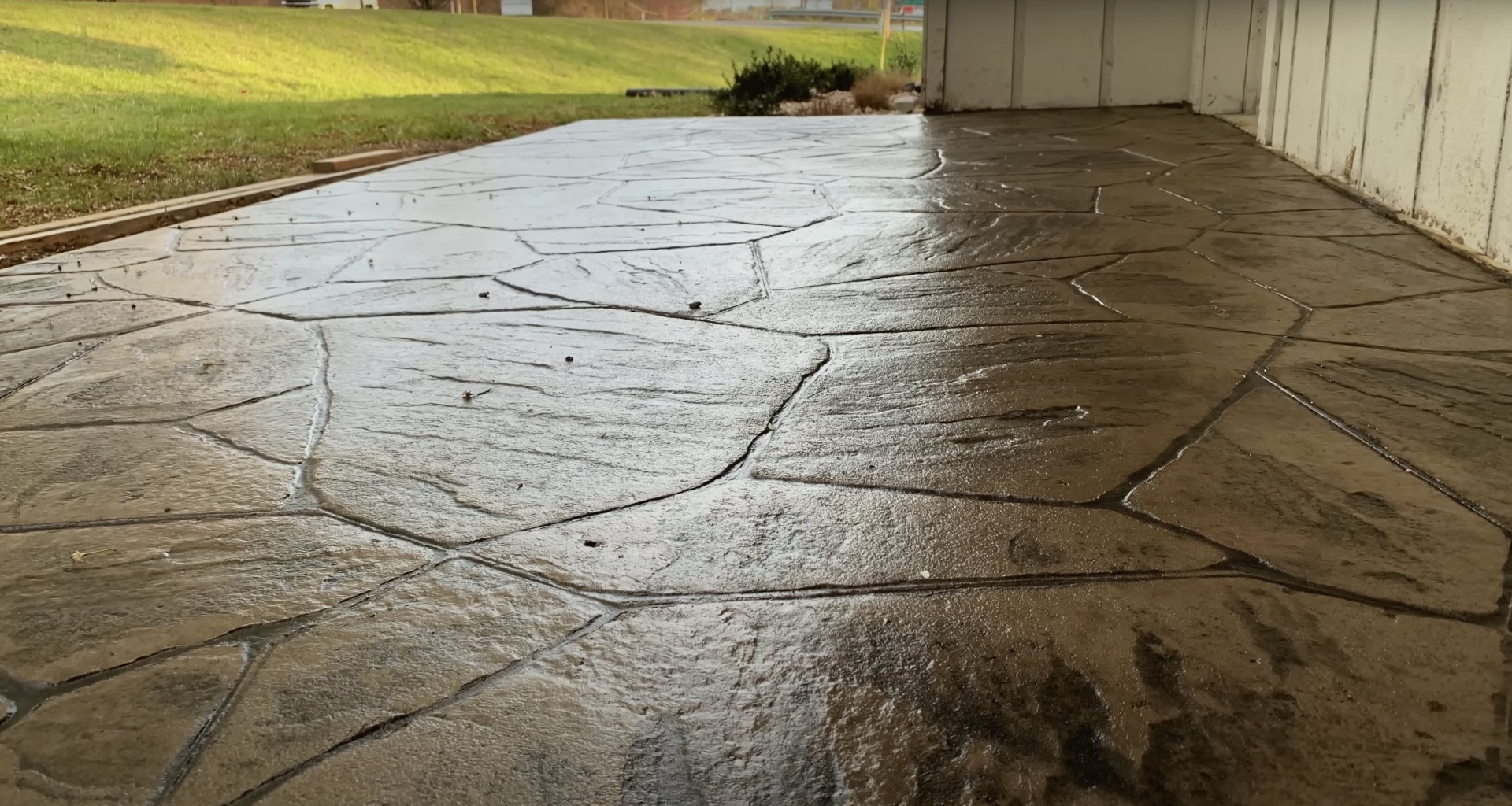 Durable concrete patio construction by Haltom City Concrete - Long-lasting residential concrete services Well-maintained concrete patio with proper jointing and drainage showing long-term durability