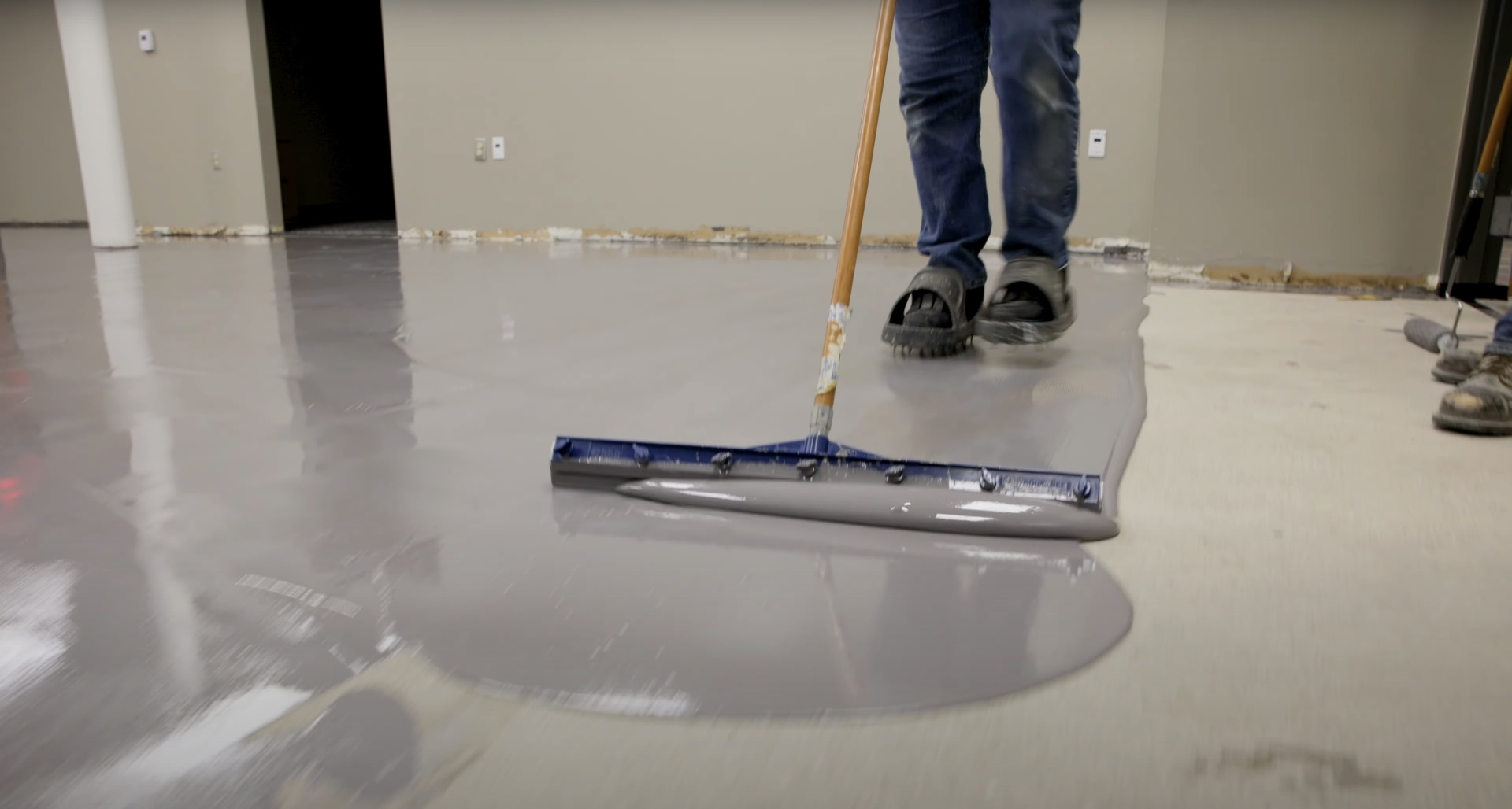 Expert concrete floor finishing by Haltom City Concrete - Professional surface preparation and smoothing Professional concrete floor finishing with specialized equipment for smooth, level surfaces